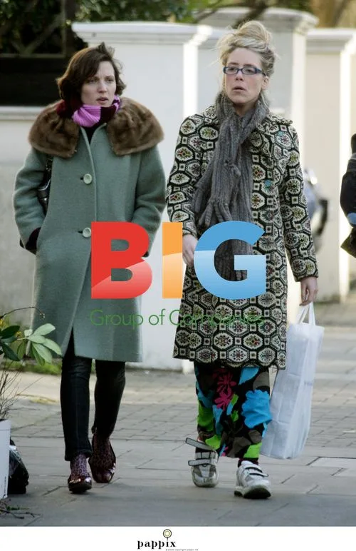 Cosmo Jenks strolls with friend in London