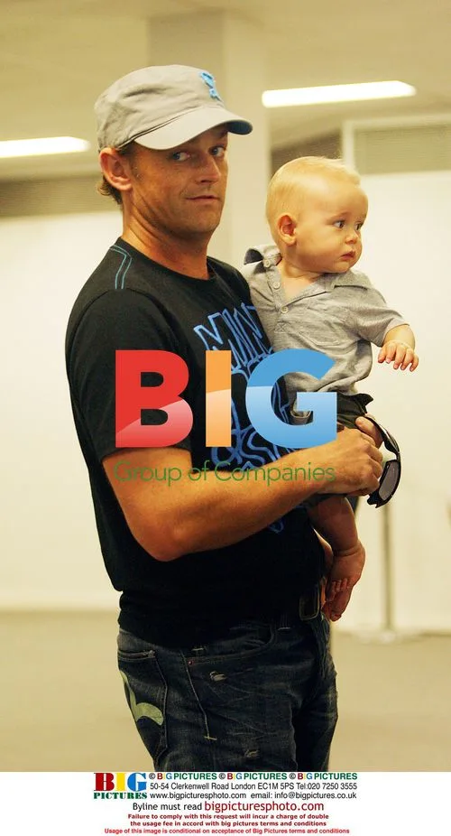 Adam Gilchrist arrives with family