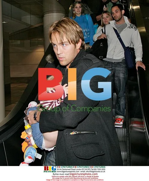 Larry Birkhead and Dannielynn Arrive at LAX