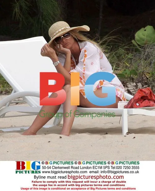 Nicollette Sherdian and Michael Bolton on Flamands Beach