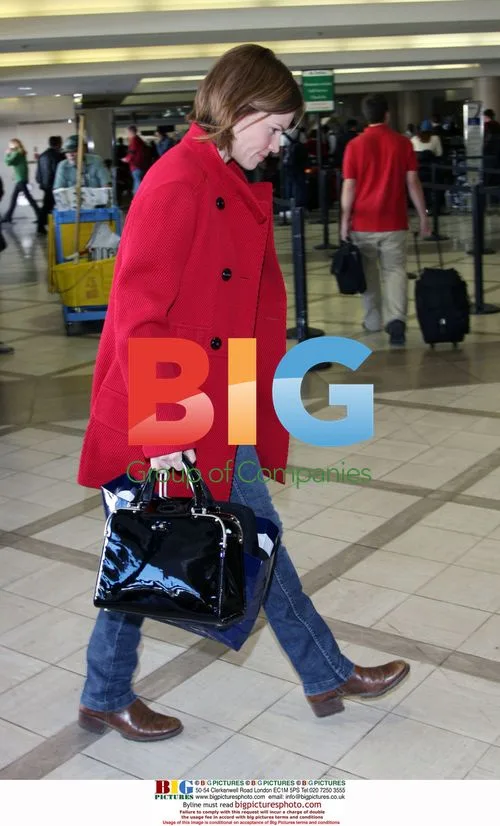 Hilary Swank Departs LAX with Boyfriend