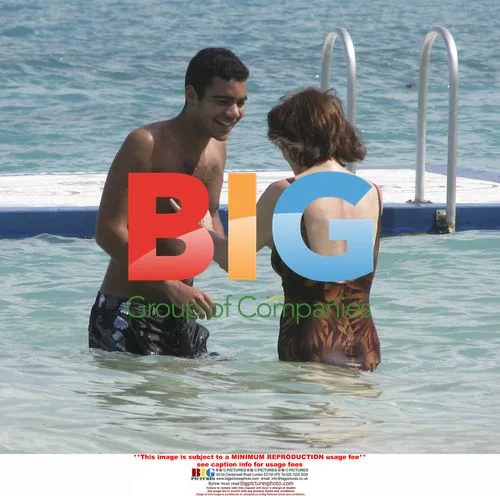 Sir Trevor McDonald on Beach Vacation with Ex-Wife and Son