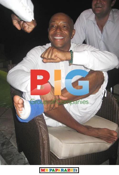 Russell Simmons with Broken Foot at Party