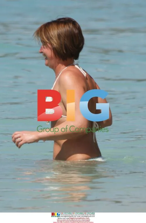 Emma Forbes relaxes on the beach in Barbados
