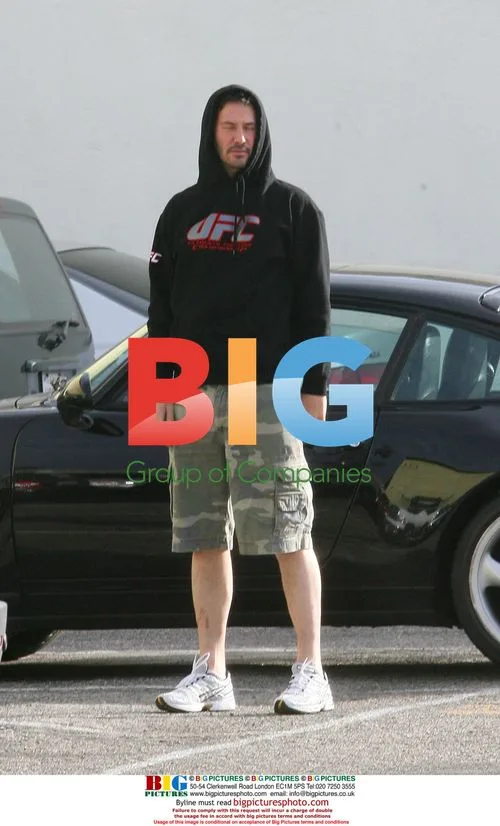 Keanu Reeves Exercises in UFC Outfit