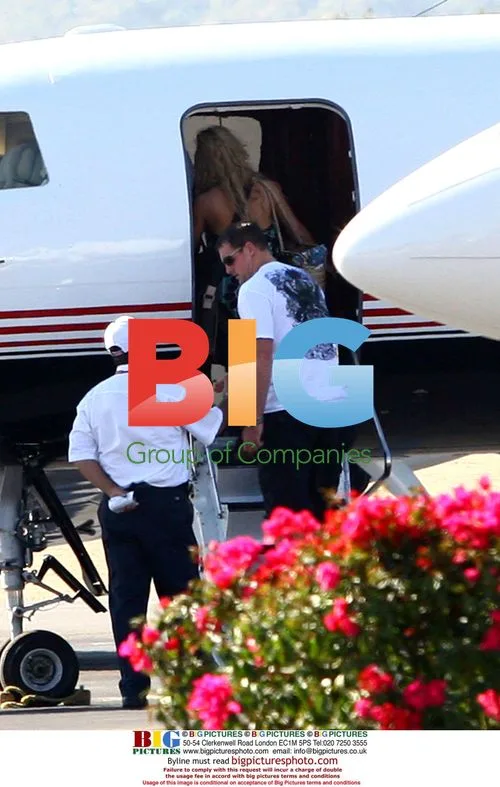 Jessica Simpson and Tony Romo Boarding Private Jet