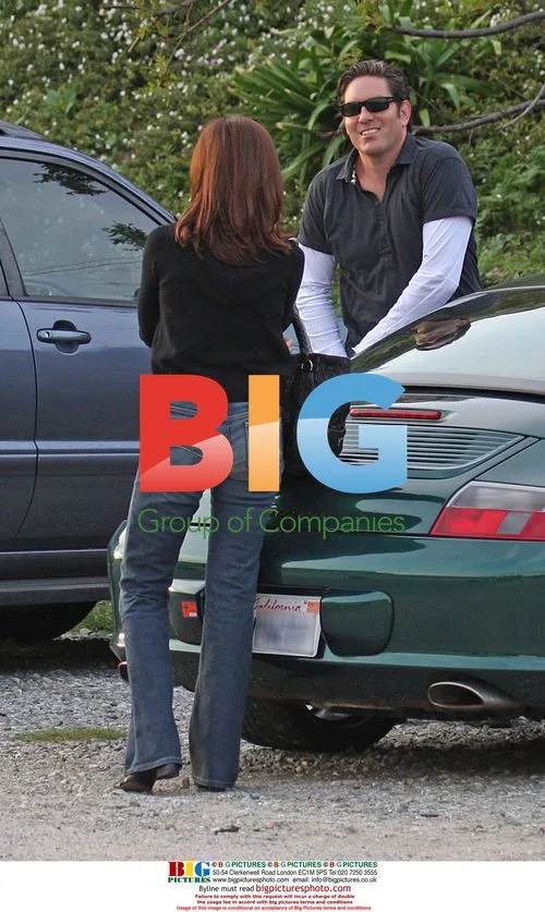 Victoria Principal with mystery man in Malibu