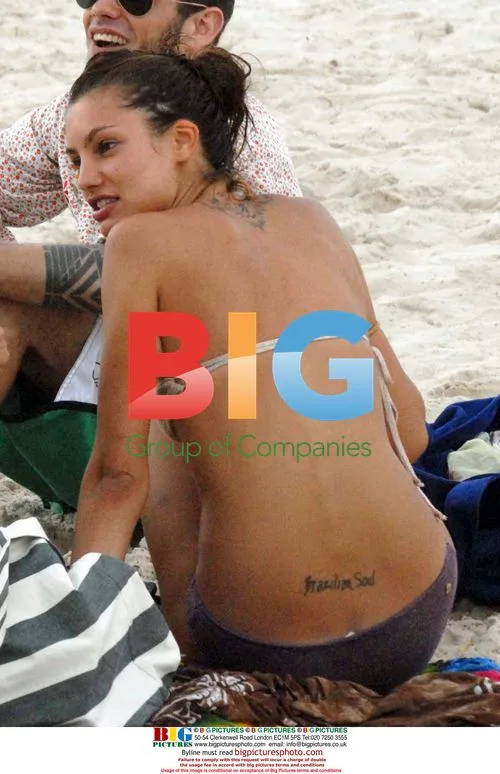 Brazilian model Natalia Andrade kissing Stravos Niarchos