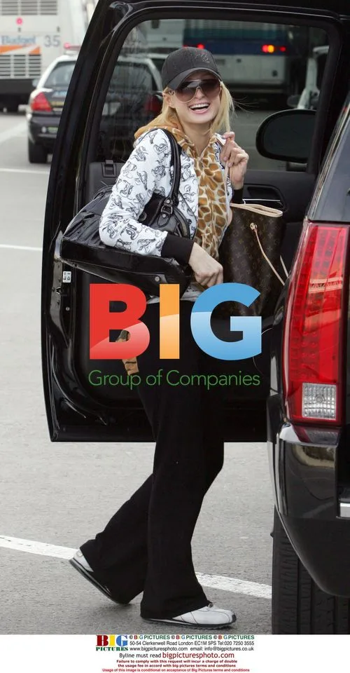 Paris Hilton at LAX in loud outfit