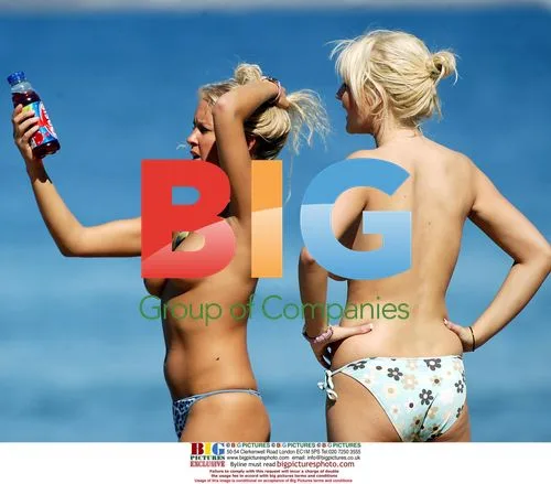 Models Anna Taverner and Michelle Marsh relaxing in France