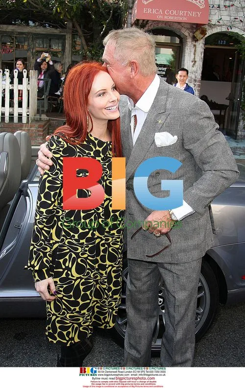 Prinz Frederick von Anhalt greets Phoebe Price