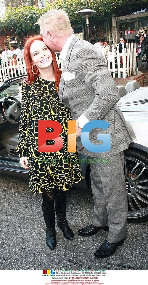 Prinz Frederick von Anhalt greets Phoebe Price