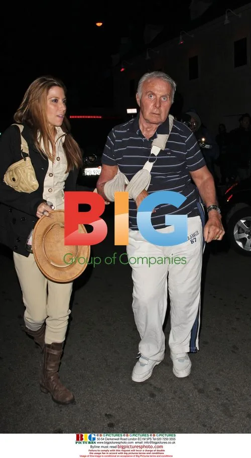 Robert Conrad Arrives for Party