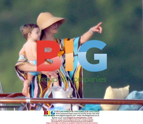 Linda Evangelista on vacation with boyfriend and sons