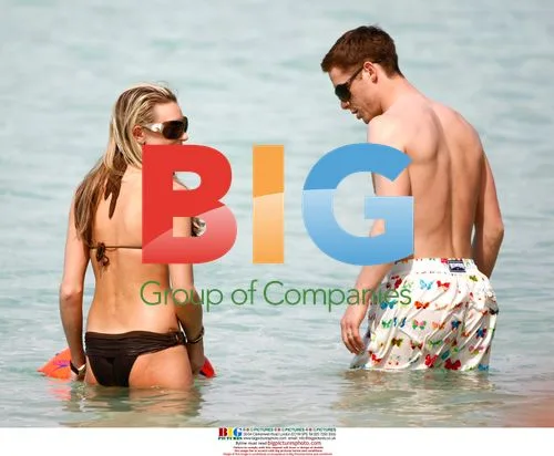 Scott Parker Relaxes on Beach with Family