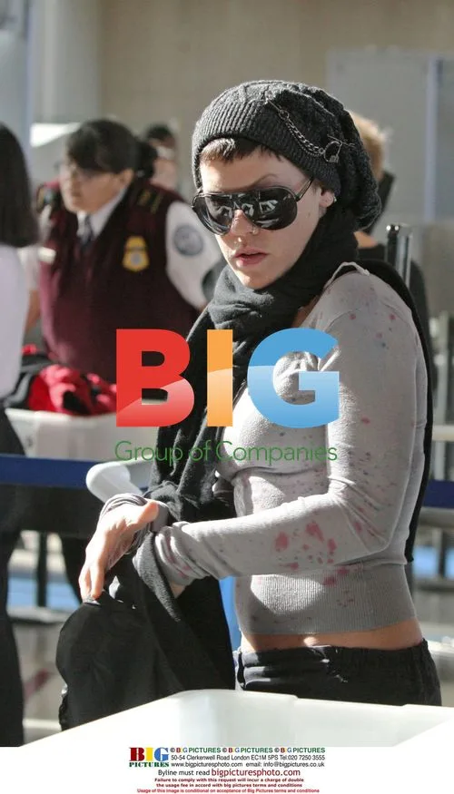 Pink and Carey Hart depart LAX