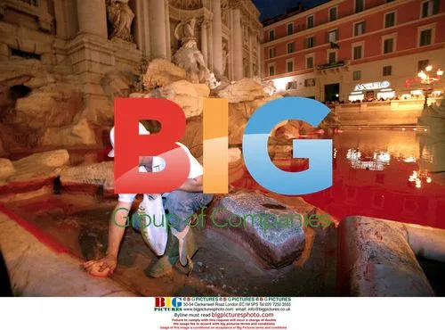 Trevi Fountain turned red by artist