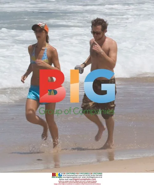 Sharni Vinson and AJ Buckley at the beach