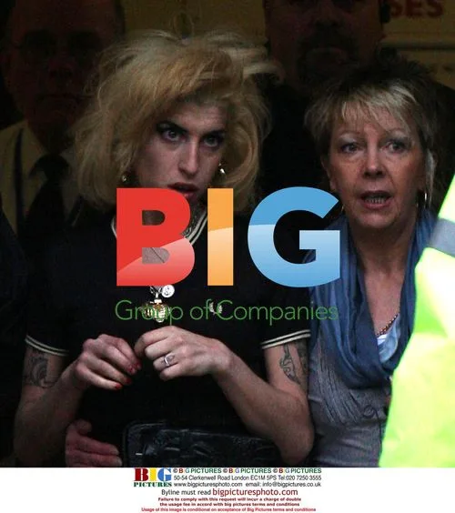 Amy Winehouse leaves court with mother-in-law