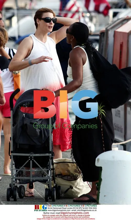 Linda Evangelista with baby on yacht