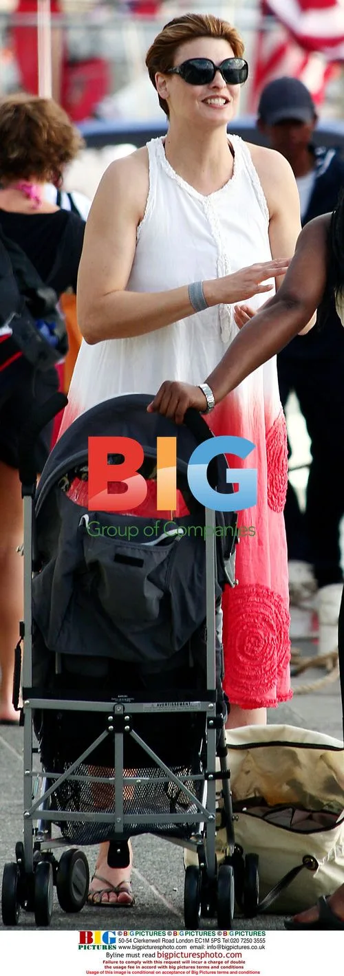 Linda Evangelista gets on yacht with baby