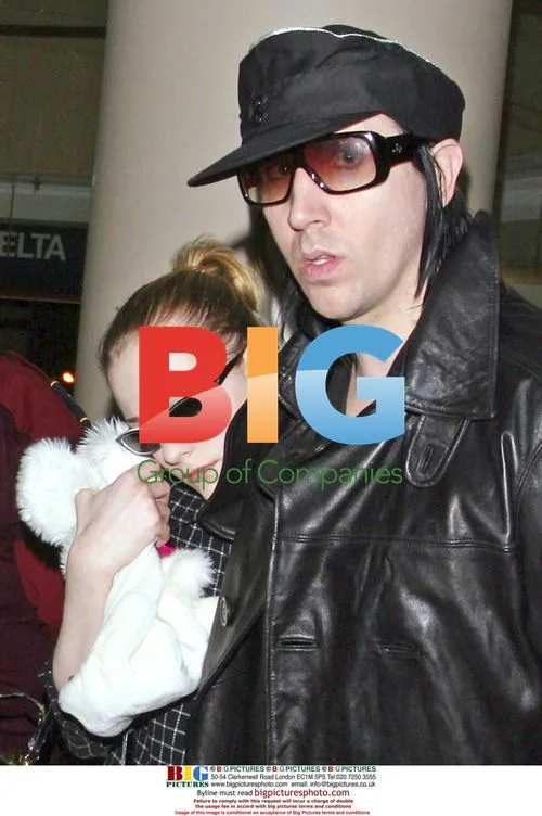Evan Rachel Wood and Marilyn Manson Depart LAX with Cat