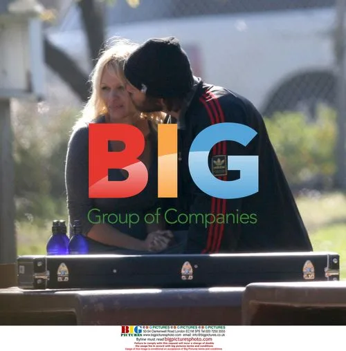 Pamela Anderson and Rick Salomon get frisky in Malibu park