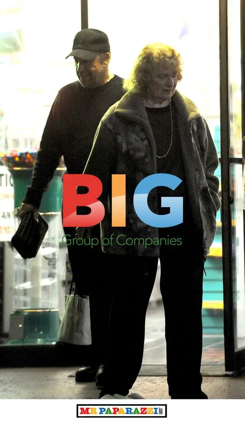 Sir Tom Jones and wife Linda seen at video rental shop