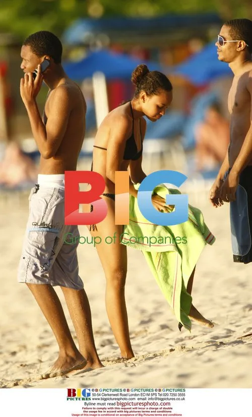 Erykah Badu chilling on Caribbean beach