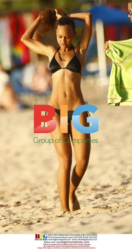 Erykah Badu in Bikini on Caribbean Beach