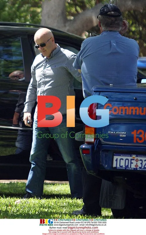 Heath Ledger's Father Visits Mother's Home
