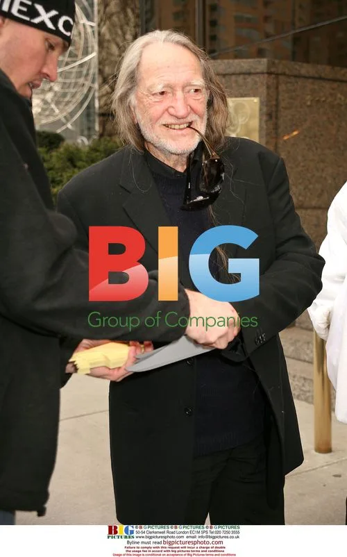 Ringo Starr and Willie Nelson Exit Hotel