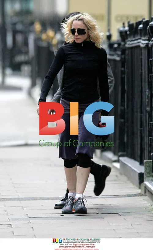 Madonna walks to gym in London
