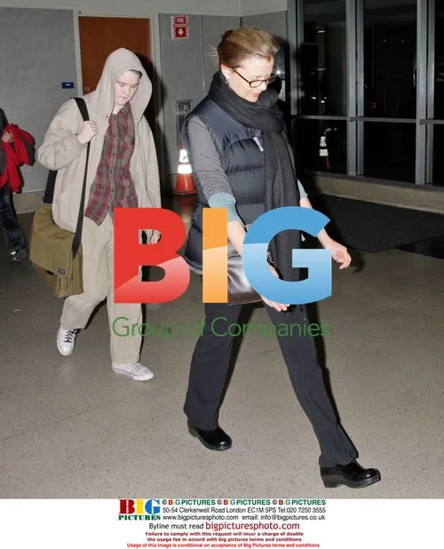 Annette Benning and Son Arrive at LAX
