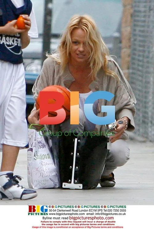 Pamela Anderson and Son at Basketball Game