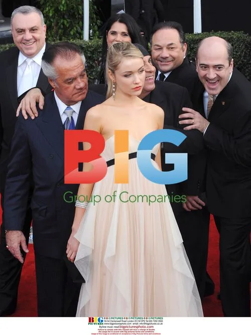 Katrina Bowden surrounded by Sopranos cast