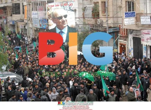 Shiite Amal group carries coffins at funerals in Beirut
