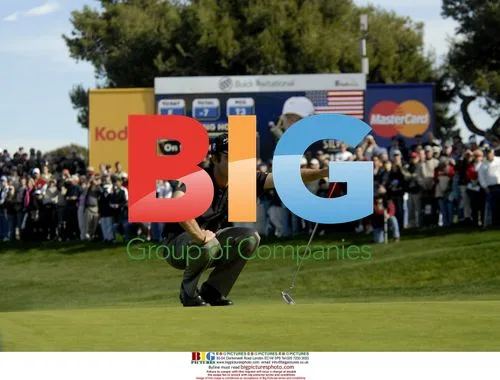 Golfer Kevin Streelman lines up putt at Buick Invitational