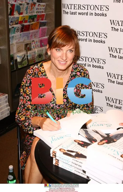 Fiona Bruce and Jacqui Hames sign book