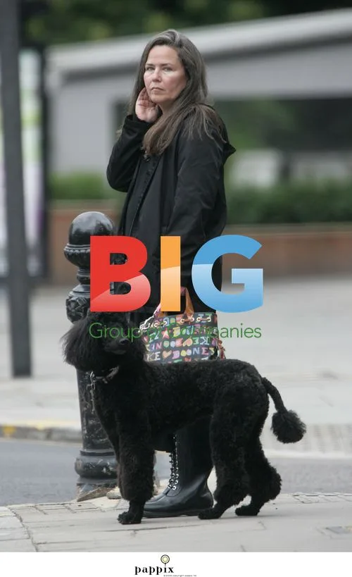 Koo Stark Spotted Walking Dog in London