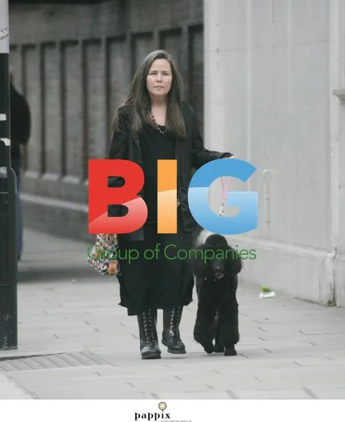 Koo Stark Spotted Walking Poodle