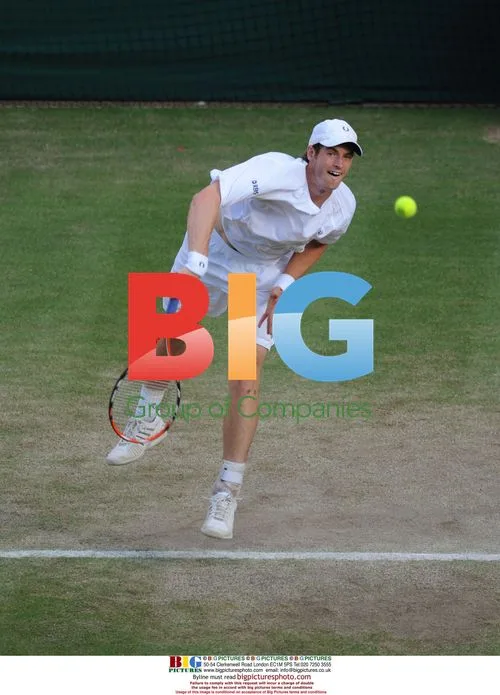 Andy Murray serves at Wimbledon quarter finals