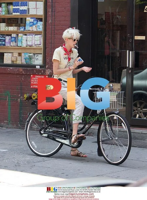 Blonde celebrity on bike in LA