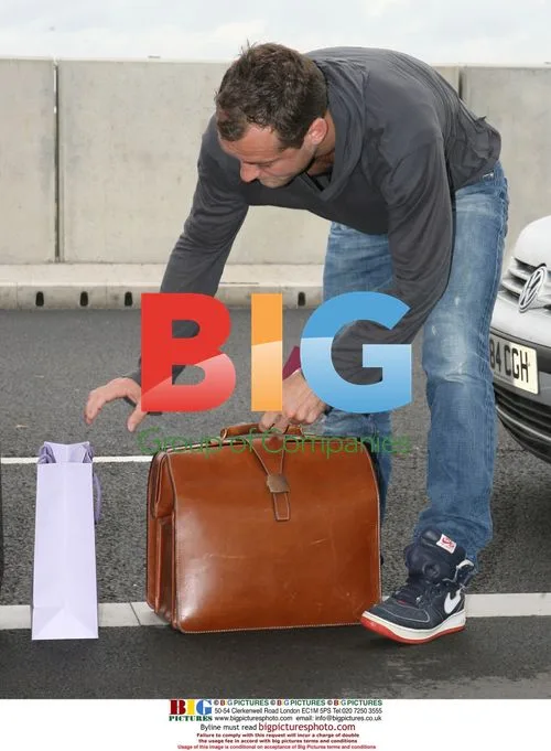 Jude Law Leaves Home for London Airport