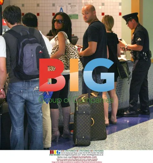 Melanie Brown Spotted at LAX