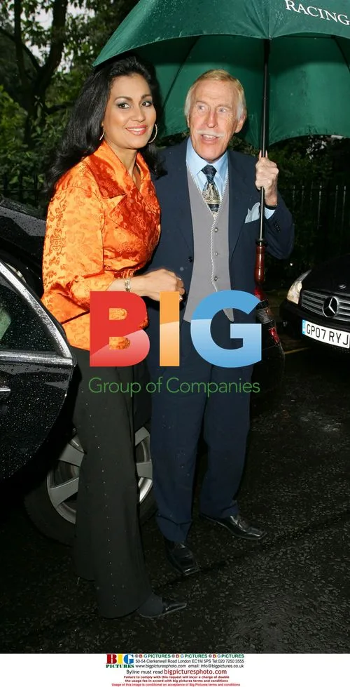 Bruce Forsyth and Wilnelia Merced at Sir David Frost party