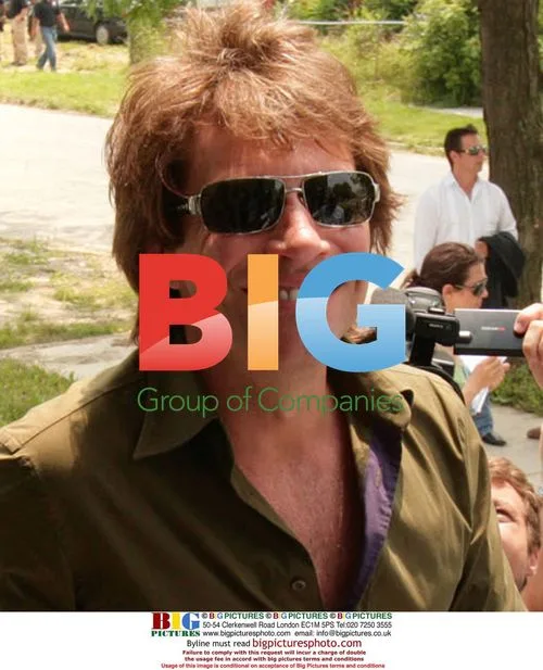 Jon Bon Jovi tours Detroit homes site