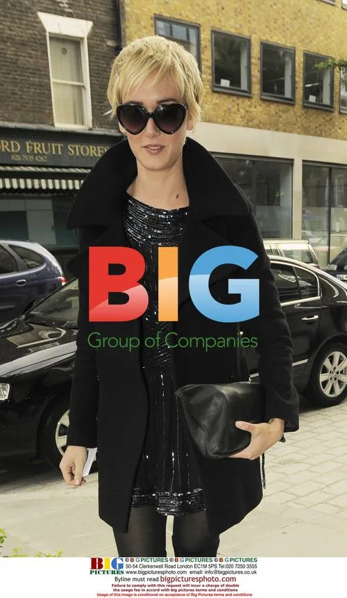 Kimberly Stewart Arrives Home in London