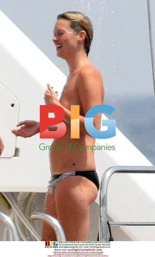 Kate Moss Topless on Yacht in Sardinia