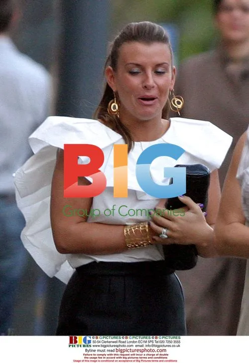 Newly wed Rooneys go for dinner in Liverpool